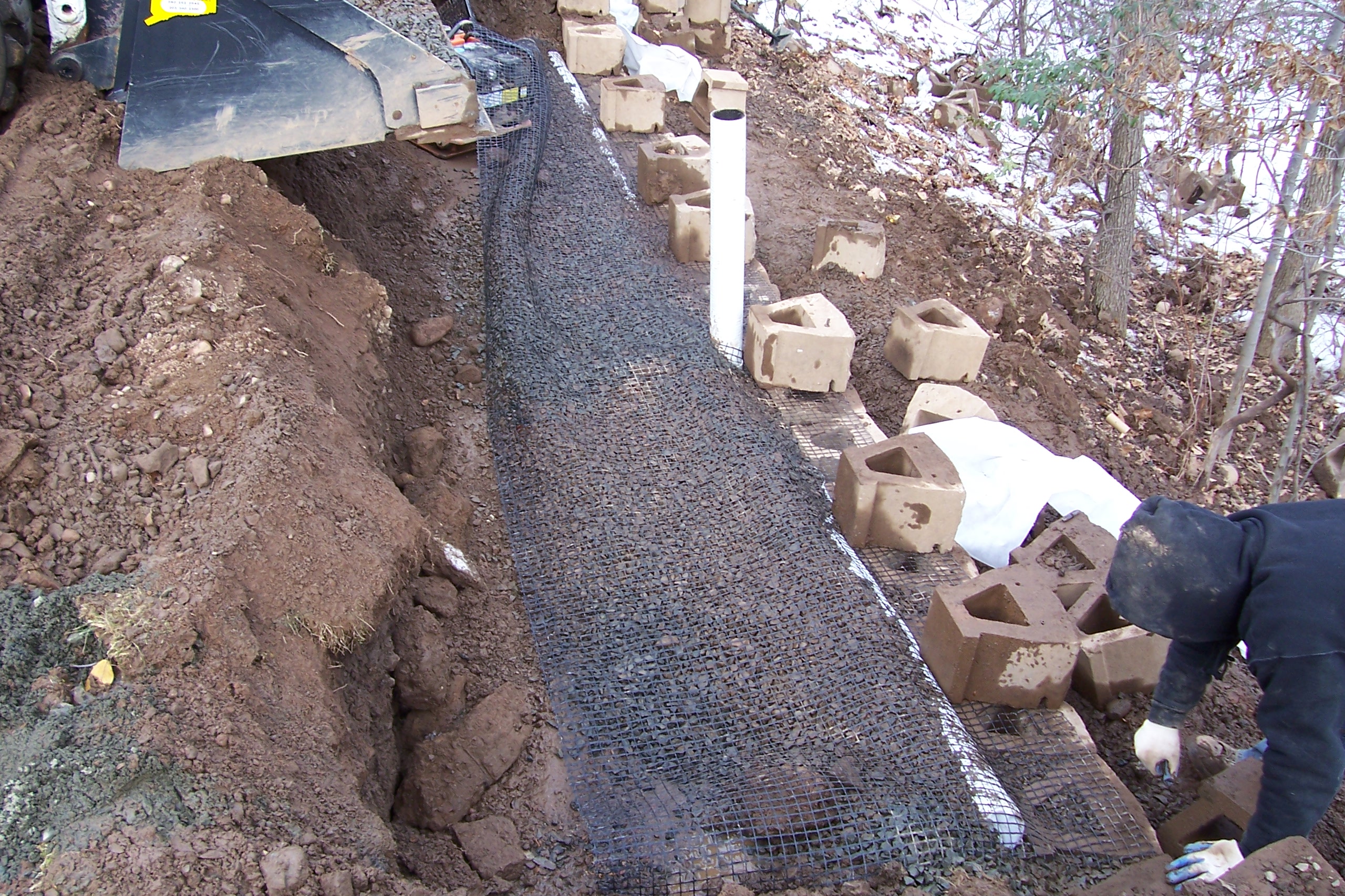 Rebuilding & Repairing a Retaining Wall Country Landscaping, LLC